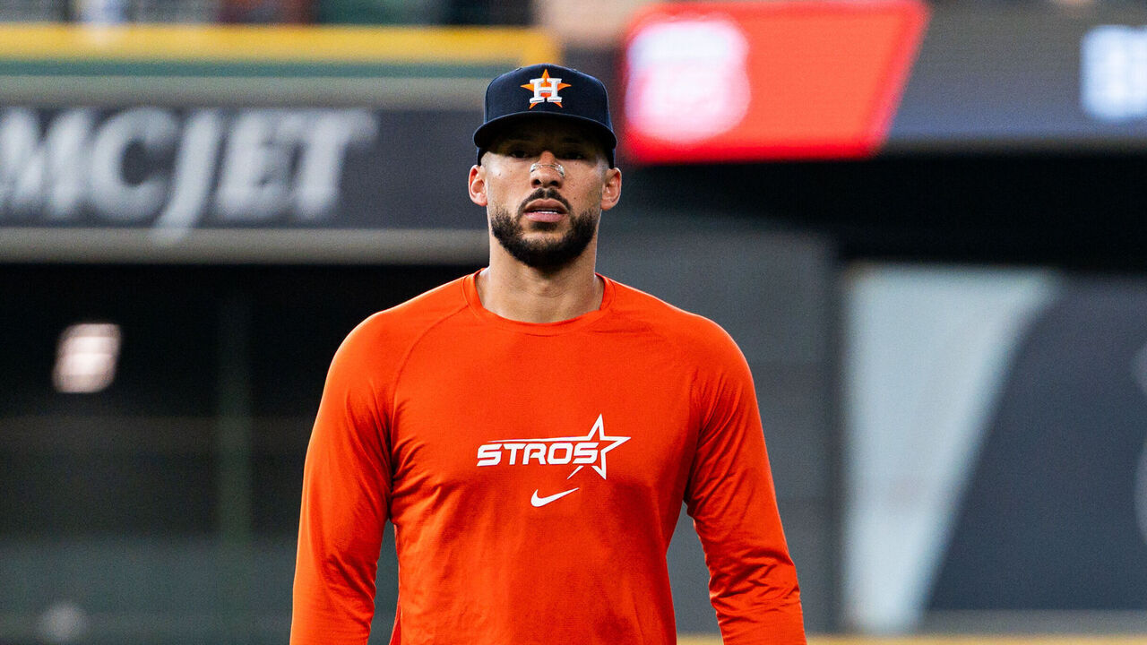 HOUSTON, TEXAS - AUGUST 01: Carlos Correa #1 of the Houston Astros works out with strength and conditioning coach Stephanie Mock Grubbs before the game against the Texas Rangers at Daikin Park on August 01, 2026 in Houston, Texas.