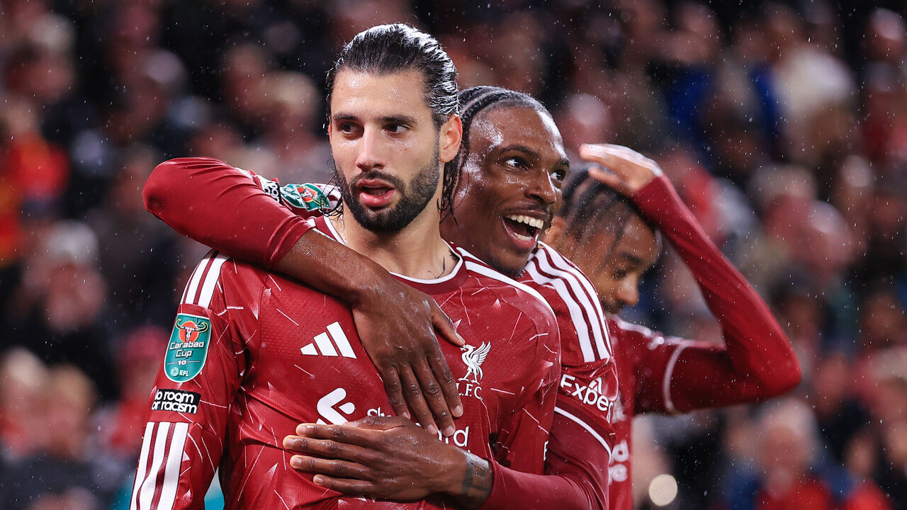 LIVERPOOL, ENGLAND - SEPTEMBER 15: Dominik Szoboszlai of Liverpool (L) celebrates with Jeremy Jacquet of Liverpool after scoring their 3rd goal during the Carabao Cup Third Round match between Liverpool and Tottenham Hotspur at Anfield on September 15, 2026 in Liverpool, England.