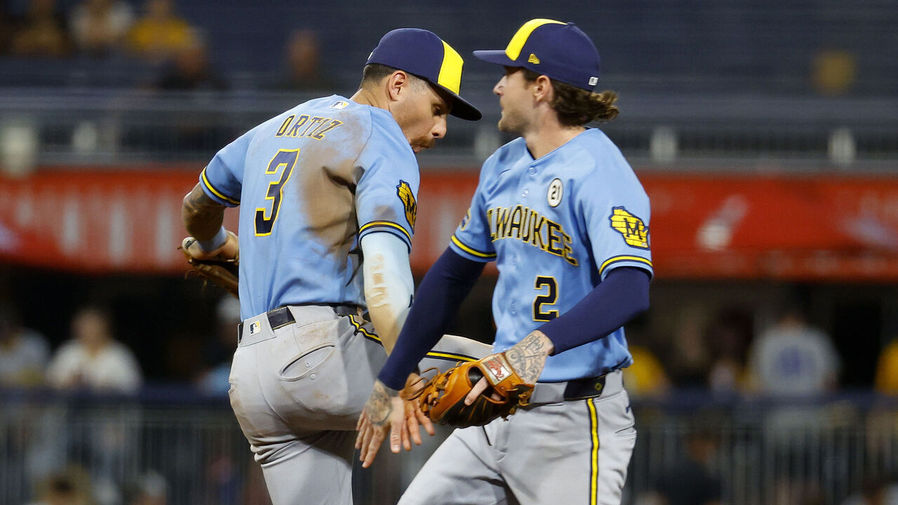 PITTSBURGH, PA - SEPTEMBER 15: Joey Ortiz #3 and Brice Turang #2 of the Milwaukee Brewers celebrate after defeating the Pittsburgh Pirates 5-1 at PNC Park on September 15, 2026, in Pittsburgh, Pennsylvania.