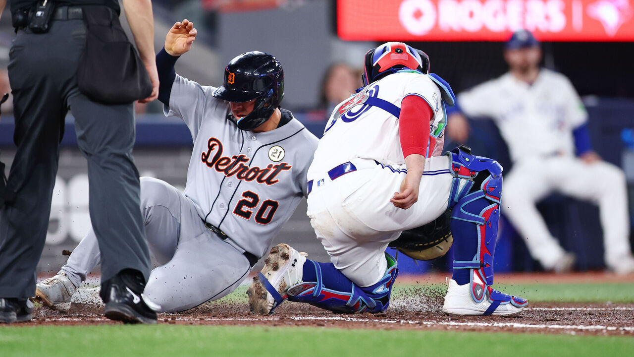 TORONTO, ON - SEPTEMBER 15: Spencer Torkelson #20 of the Detroit Tigers scores on a single off the bat of John Peck in the seventh inning against the Toronto Blue Jays at Rogers Centre on September 15, 2026 in Toronto, Ontario, Canada.