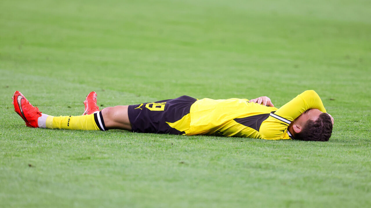 DORTMUND, GERMANY - SEPTEMBER 8: Konstantinos Karetsas of BVB Borussia Dortmund is injured on the ground during the UEFA Champions League 2026/27 League Phase MD1 match between Borussia Dortmund and Villarreal CF at BVB Stadion Dortmund on September 8, 2026 in Dortmund, Germany.