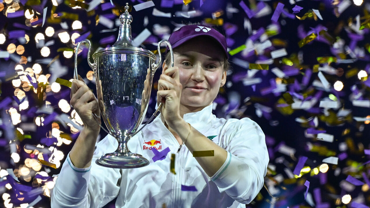 RIYADH, SAUDI ARABIA NOVEMBER 8, 2025:Elena Rybakina of Kazakhstan celebrates with the Billie Jean King Trophy after defeating Aryna Sabalenka in the singles final on Day 8 of the 2025 WTA Finals, part of the Hologic WTA Tour, at King Saud University Indoor Arena in Riyadh, Saudi Arabia.