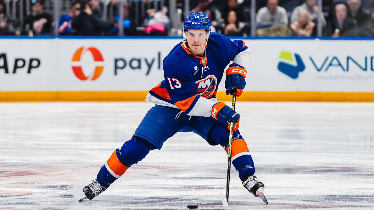 ELMONT, NEW YORK - APRIL 11: Mathew Barzal #13 of the New York Islanders skates with the puck against the Ottawa Senators during the third period at UBS Arena on April 11, 2026 in Elmont, New York.