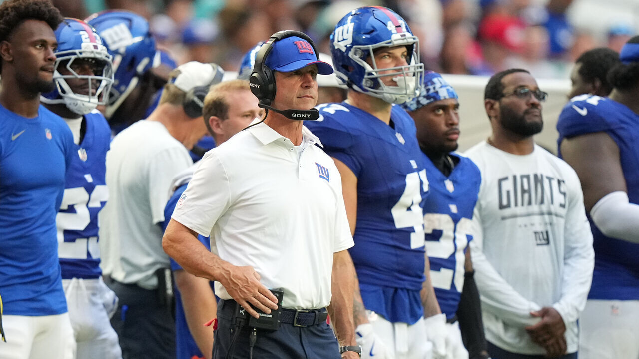 MIAMI GARDENS, FL - AUGUST 22: New York Giants head caoch John Harbaugh watches the action during the preseason NFL game between the New York Giants and the Miami Dolphins on Saturday, August 22, 2026 at Hard Rock Stadium in Miami, FL