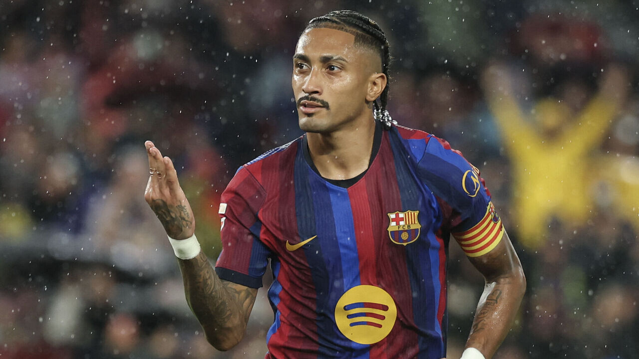 Barcelona's Brazilian forward #11 Raphinha celebrates scoring his team's fifth goal and a hat-trick during the Spanish league football match between FC Barcelona and Racing Santander at the Camp Nou stadium in Barcelona on September 16, 2026.