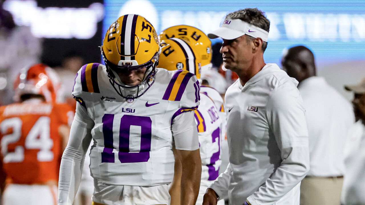BATON ROUGE, LA - SEPTEMBER 05: Sam Leavitt #10 of the LSU Tigers talks with head coach Lane Kiffin before a game against the Clemson Tigers at Tiger Stadium on September 5, 2026 in Baton Rouge, Louisiana.