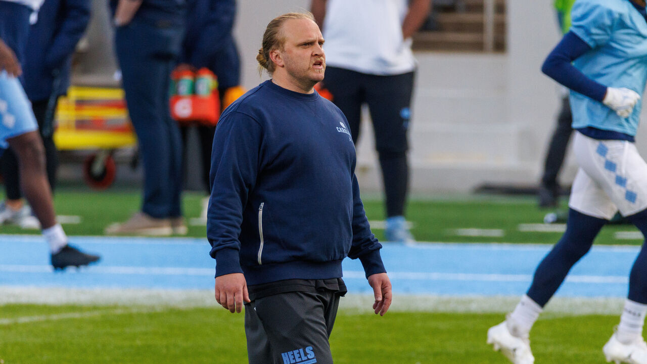 CHAPEL HILL, NORTH CAROLINA - APRIL 12: Defensive Coordinator Steve Belichick of the North Carolina Tar Heels at Kenan Stadium on April 12, 2025 in Chapel Hill, North Carolina.