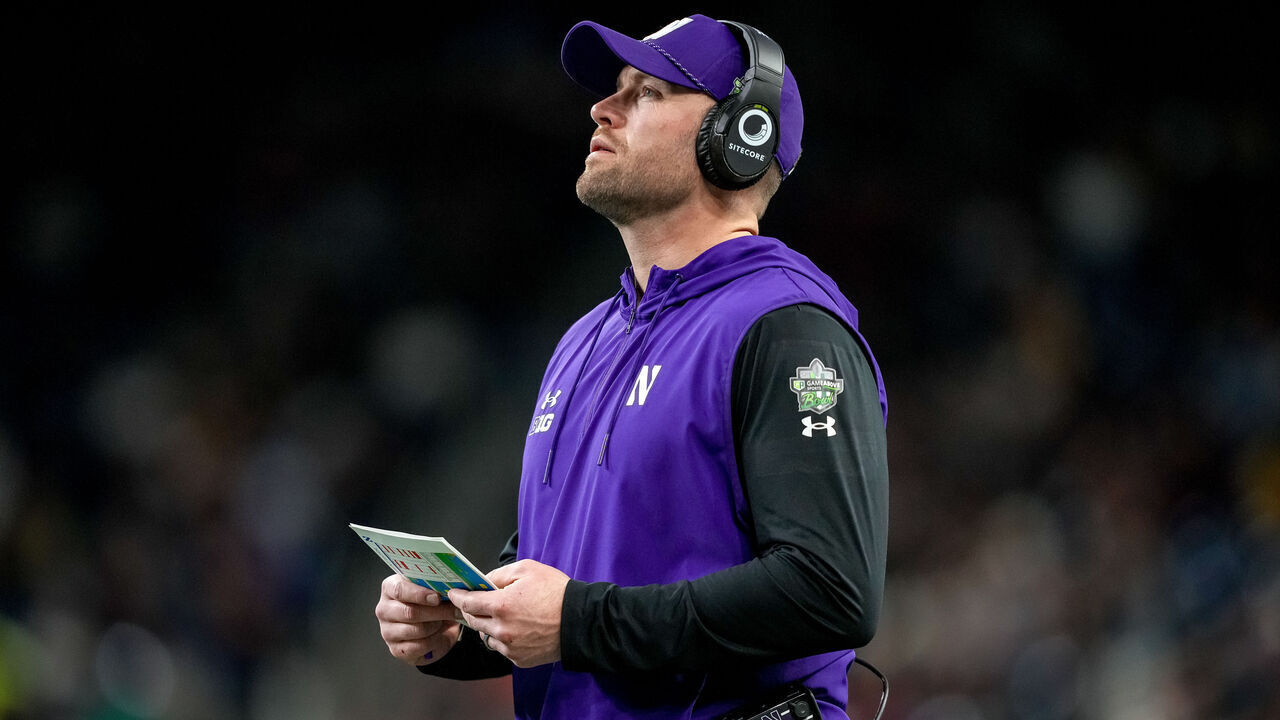 DETROIT, MICHIGAN - DECEMBER 26: Head coach David Braun of the Northwestern Wildcats looks on against the Central Michigan Chippewas during the 2025 GameAbove Sports Bowl at Ford Field on December 26, 2025 in Detroit, Michigan.