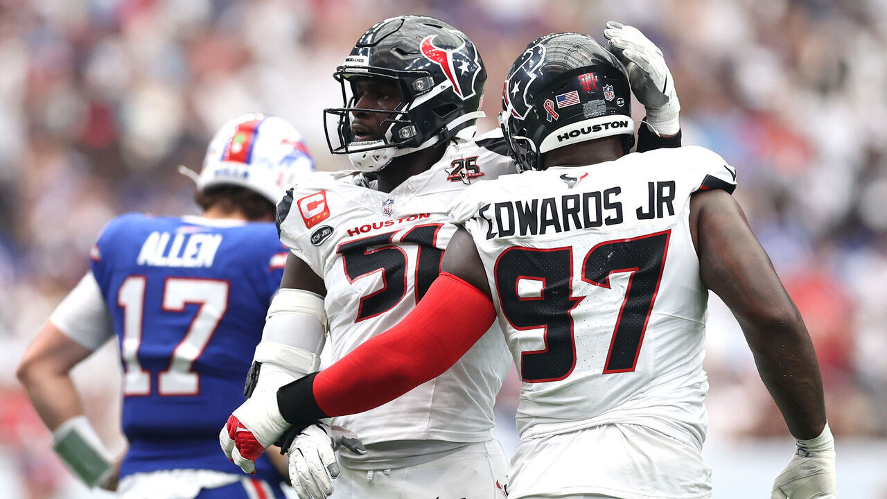 HOUSTON, TEXAS - SEPTEMBER 13: Will Anderson Jr. #51 and Mario Edwards Jr. #97 of the Houston Texans celebrate after Anderson Jr.'s tackle against the Buffalo Bills in the third quarter of a game at NRG Stadium on September 13, 2026 in Houston, Texas.