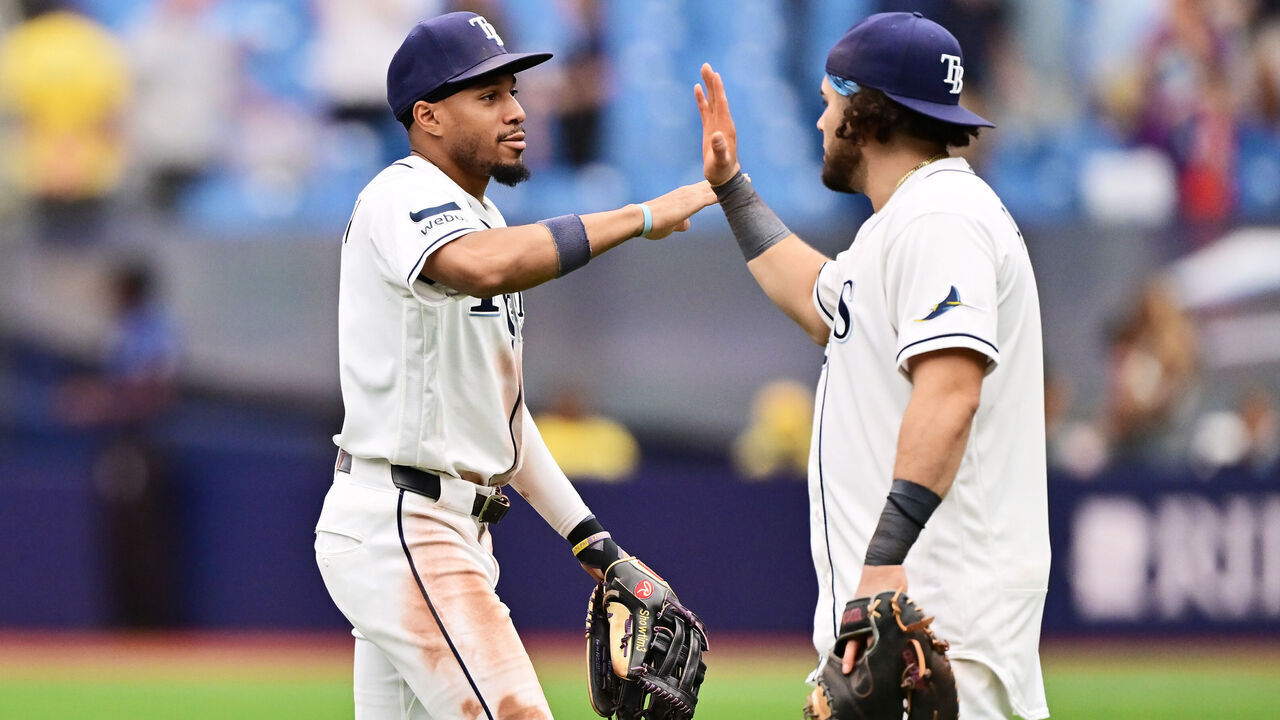 ST PETERSBURG, FLORIDA - SEPTEMBER 17: Chandler Simpson #14 celebrates with Jonathan Aranda #8 of the Tampa Bay Rays after defeating the Athletics 10-1 at Tropicana Field on September 17, 2026 in St Petersburg, Florida.