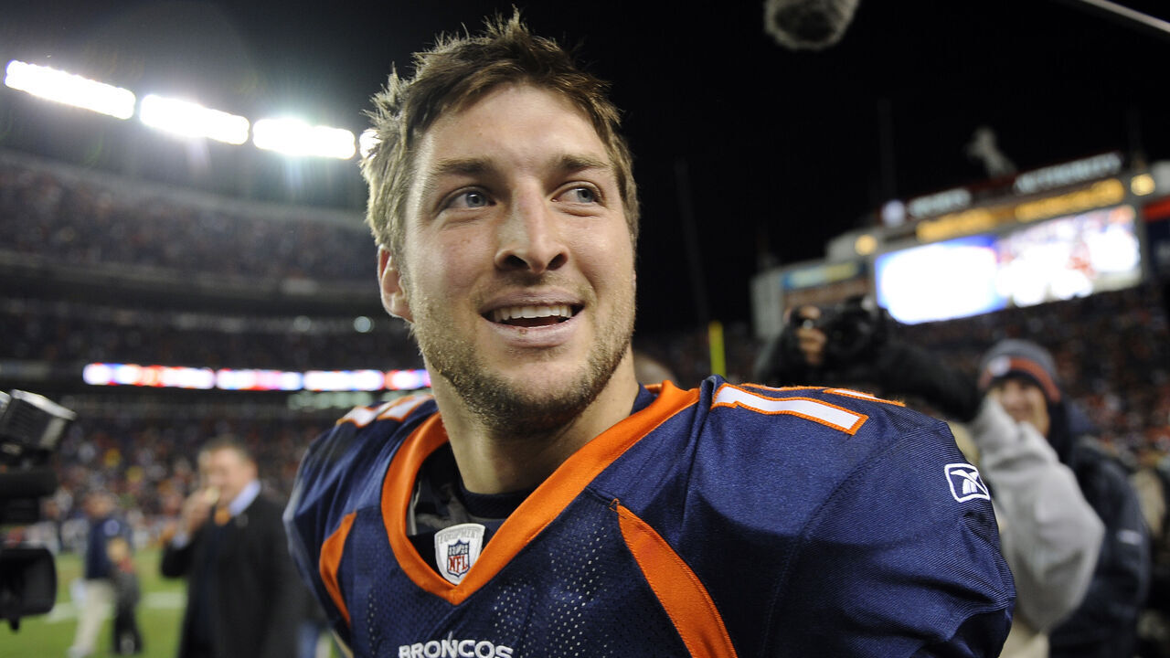 Denver Broncos quarterback Tim Tebow after his 80 yd touchdown pass to beat the Pittsburgh Steelers 29-23 in the first round of the AFC playoffs Sunday January 8, 2012 at Sports Authority Field at Mile High. HYOUNG CHANG, The Denver Post