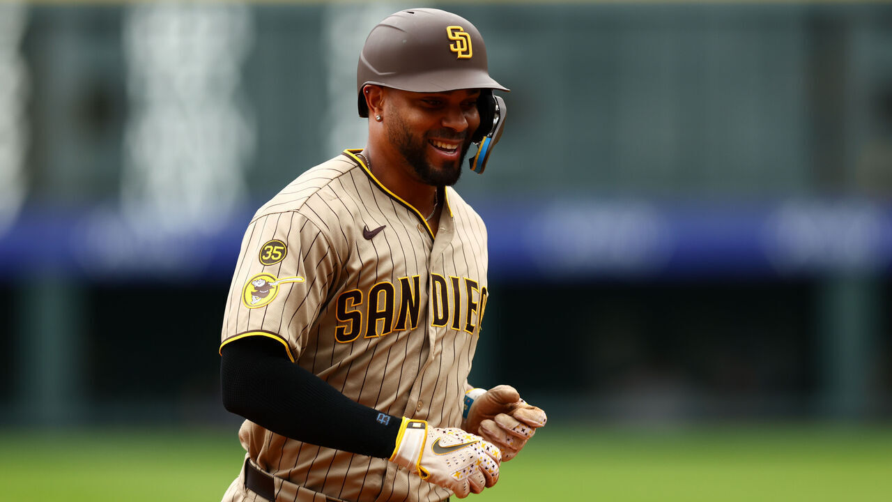 DENVER, CO - SEPTEMBER 17: Xander Bogaerts #2 of the San Diego Padres smiles as he jogs around the bases after hitting a solo home run in the second inning against the Colorado Rockies at Coors Field on September 17, 2026 in Denver, Colorado.