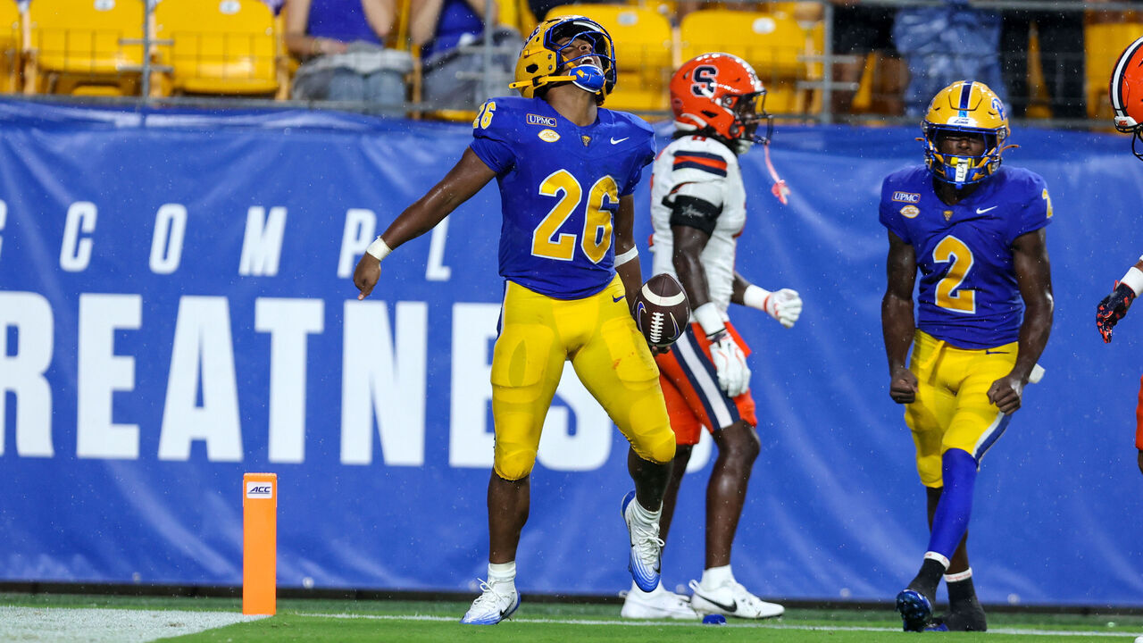 PITTSBURGH, PA - SEPTEMBER 17: Pittsburgh Panthers running back Damon Ferguson Jr. (26) celebrates after scoring on a 32-yard touchdown run during the second quarter of the college football game between the Syracuse Orange and Pittsburgh Panthers on September 17, 2026, at Acrisure Stadium in Pittsburgh, PA.