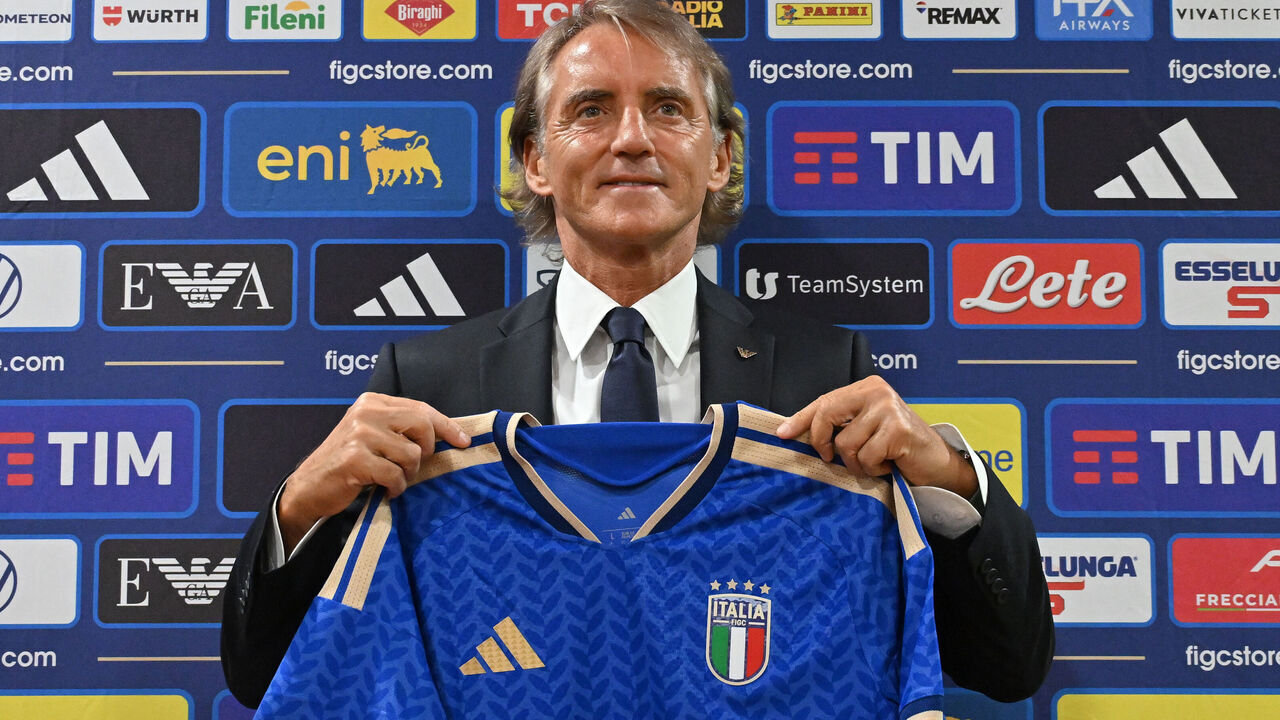New Italy head coach Roberto Mancini poses with Italy jersey at FIGC Press conference Room in Rome (Italy), July 29th, 2026