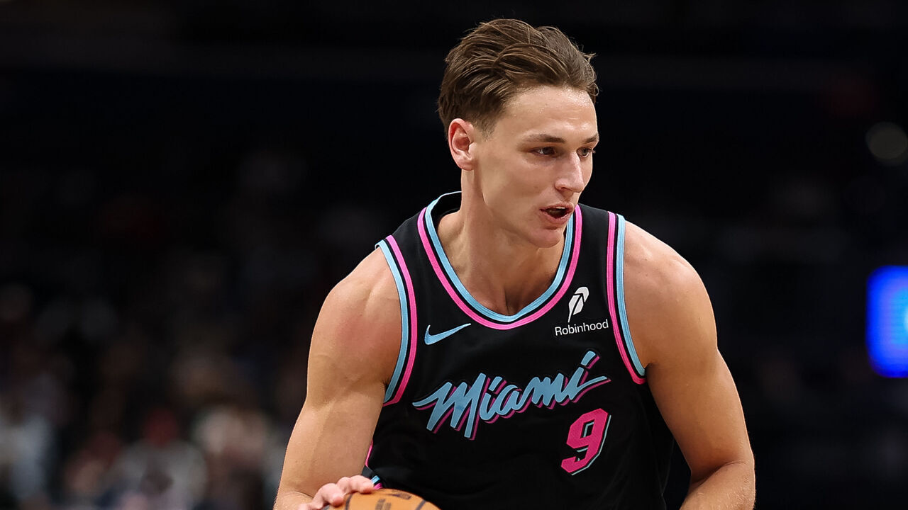 WASHINGTON, DC - APRIL 10: Pelle Larsson #9 of the Miami Heat drives to the basket against the Washington Wizards during the first half at Capital One Arena on April 10, 2026 in Washington, DC.