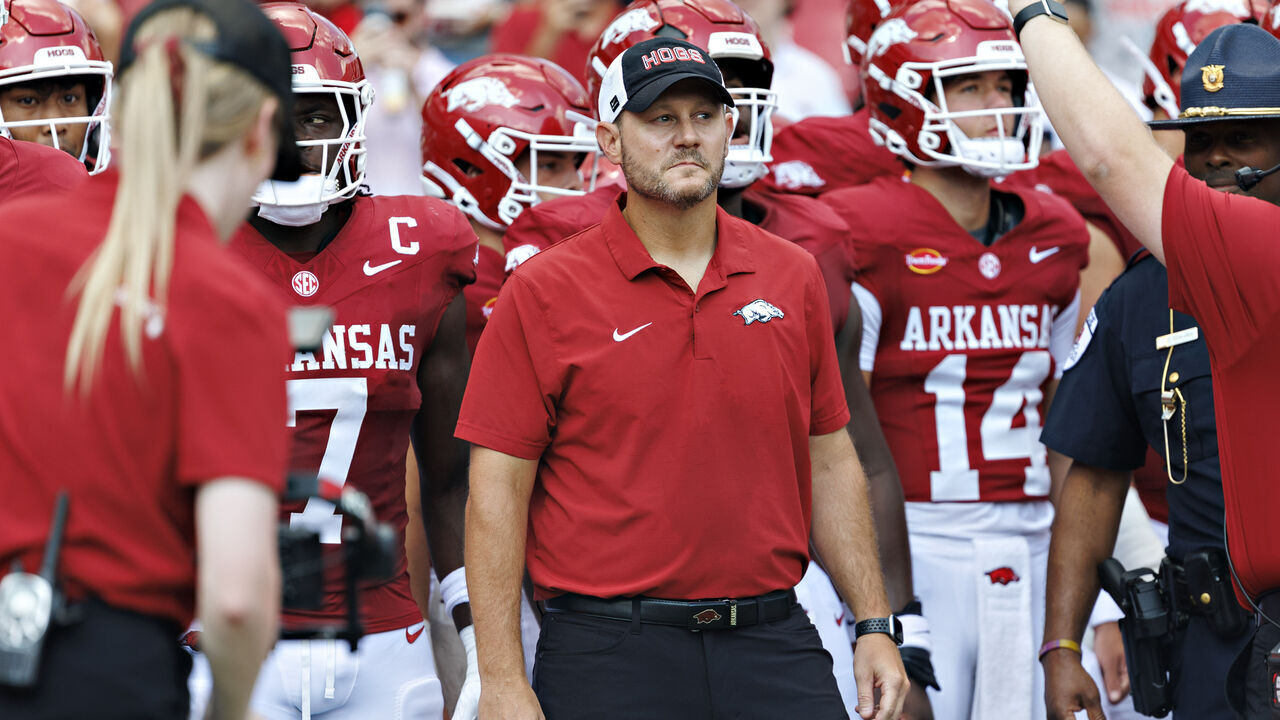 FAYETTEVILLE, ARKANSAS - SEPTEMBER 05: Head Coach Ryan Silverfield of the Arkansas Razorbacks prepares to run onto the field before the game against the North Alabama Lions at Donald W. Reynolds Razorback Stadium on September 05, 2026 in Fayetteville, Arkansas. The Razorbacks defeated the Lions 31-14.