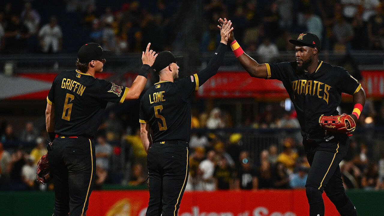 PITTSBURGH, PENNSYLVANIA - SEPTEMBER 18: Oneil Cruz #15 of the Pittsburgh Pirates celebrates with Brandon Lowe #5 and Konnor Griffin #6 after the final out in an 8-5 win over the Kansas City Royals during the game at PNC Park on September 18, 2026 in Pittsburgh, Pennsylvania.