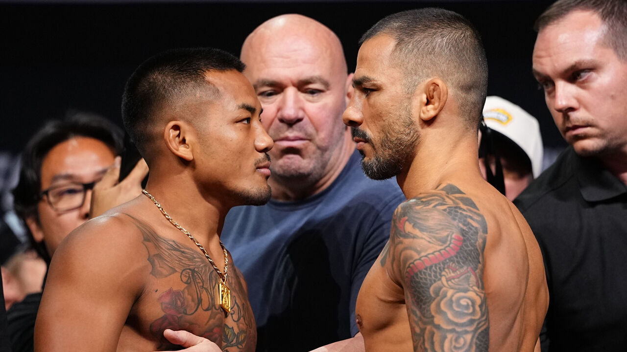 LOS ANGELES, CALIFORNIA - SEPTEMBER 18: (L-R) Opponents Joshua Van of Myanmar and Alexandre Pantoja of Brazil face off during the UFC 331 ceremonial weigh-in at Crypto.com Arena on September 18, 2026 in Los Angeles, California.