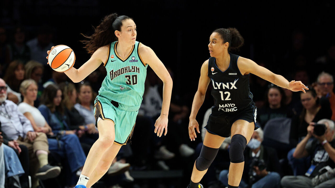 MINNEAPOLIS, MINNESOTA - SEPTEMBER 18: Breanna Stewart #30 of the New York Liberty dribbles the ball against Nia Brodie #12 of the Minnesota Lynx in the third quarter at Target Center on September 18, 2026 in Minneapolis, Minnesota. The Liberty defeated the Lynx 93-81.
