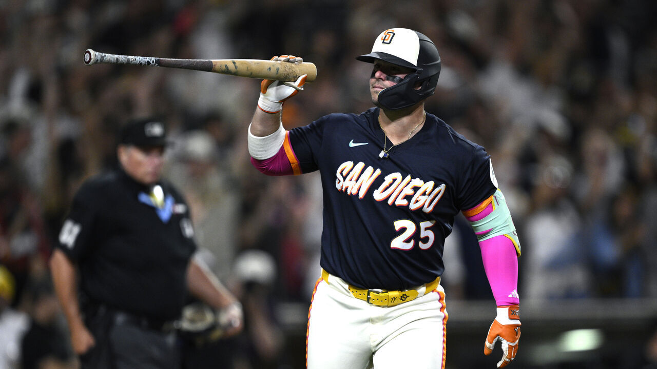 SAN DIEGO, CALIFORNIA - SEPTEMBER 18: Ty France #25 of the San Diego Padres tosses his bat after hitting a three-run home run against the Miami Marlins during the fifth inning at Petco Park on September 18, 2026 in San Diego, California.