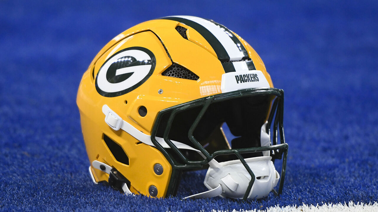 INDIANAPOLIS, IN - AUGUST 16: A Green Bay Packers helmet sits on the field before the NFL preseason game between the Green Bay Packers and the Indianapolis Colts on August 16, 2025, at Lucas Oil Stadium in Indianapolis, Indiana.