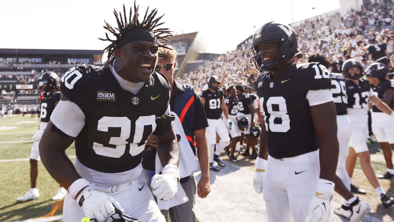 NASHVILLE, TENNESSEE - SEPTEMBER 19: Austin Howard #30 of the Vanderbilt Commodores celebrates after a last second comeback win against the NC State Wolfpack at FirstBank Stadium on September 19, 2026 in Nashville, Tennessee.