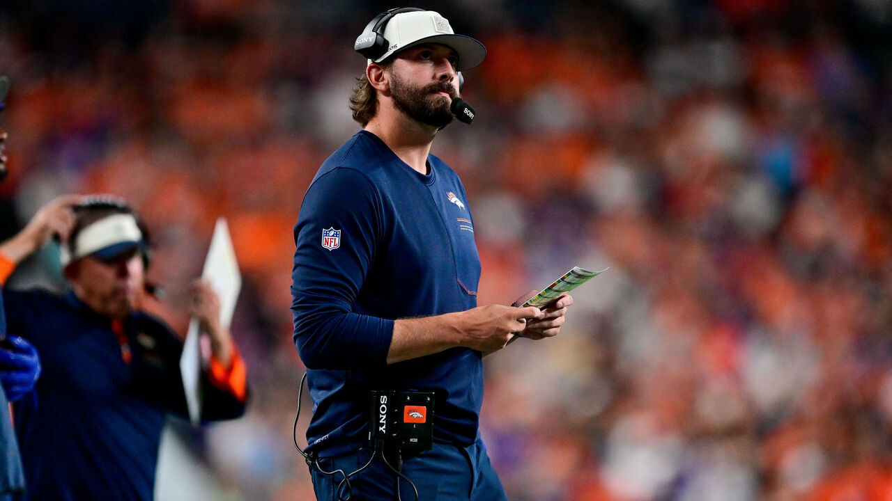 DENVER, CO - AUGUST 28: Denver Broncos offensive coordinator Davis Webb looks on during a preseason game against the Minnesota Vikings at Empower Field at Mile High on August 28, 2026 in Denver, Colorado.
