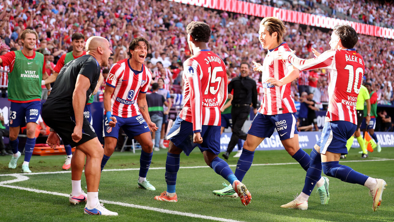 MADRID, SPAIN - SEPTEMBER 20: Jonathan David of Atletico Madrid celebrates scoring his team’s second goal with teammates during the LaLiga EA Sports 2026/27 match between Atletico de Madrid and Real Madrid at Riyadh Air Metropolitano on September 20, 2026 in Madrid, Spain.