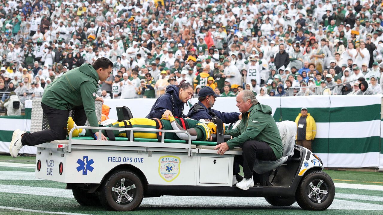 EAST RUTHERFORD, NEW JERSEY - SEPTEMBER 20: Jayden Reed #11 of the Green Bay Packers is taken off the field due to an injury against the New York Jets during the first half of the game at MetLife Stadium on September 20, 2026 in East Rutherford, New Jersey.