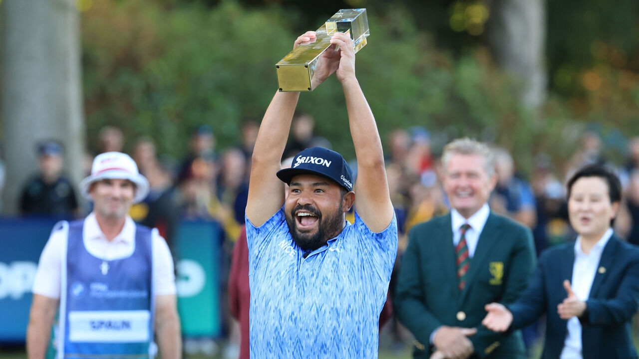 VIRGINIA WATER, ENGLAND - SEPTEMBER 20: J.J. Spaun of the United States lifts the trophy following his victory on Day Four of the BMW PGA Championship at Wentworth Golf Club on September 20, 2026 in Virginia Water, United Kingdom.
