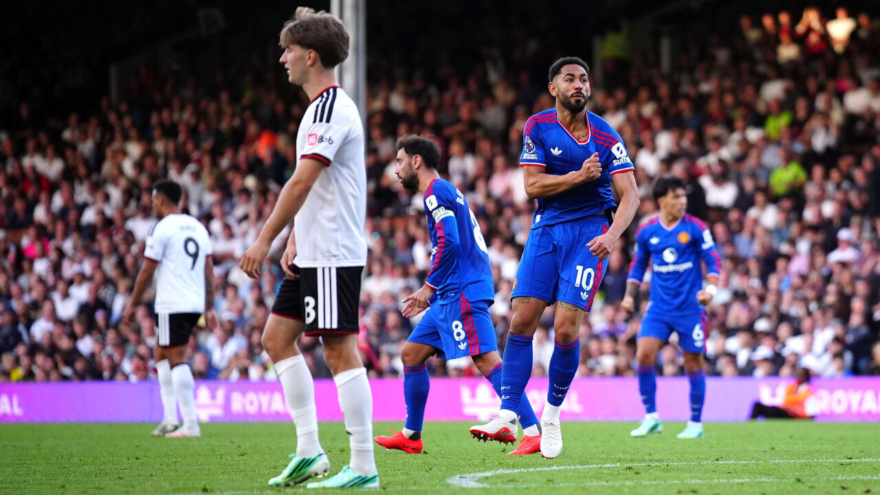Manchester United's Matheus Cunha celebrates scoring their side's first goal of the game during the Premier League match at Craven Cottage, London. Picture date: Sunday September 20, 2026.