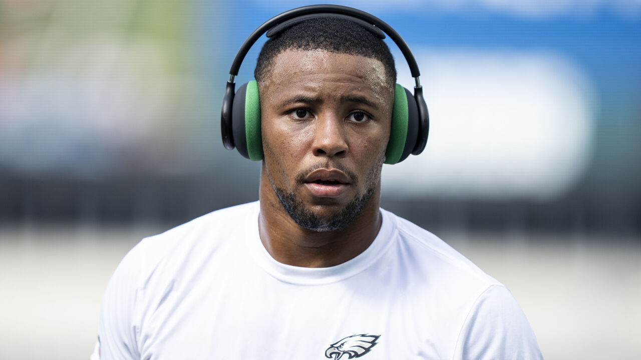 PHILADELPHIA, PENNSYLVANIA - SEPTEMBER 13: Saquon Barkley #26 of the Philadelphia Eagles looks on as he warms up against the Washington Commanders prior to an NFL football game at Lincoln Financial Field on September 13, 2026 in Philadelphia, Pennsylvania.
