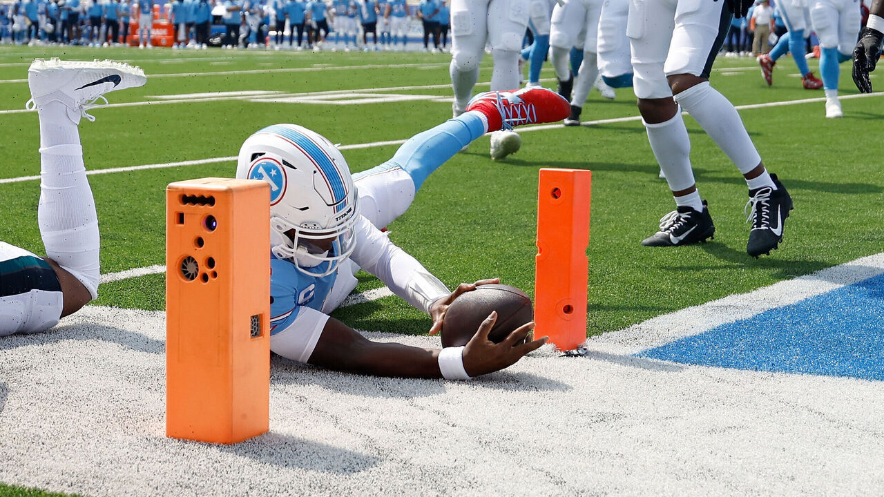 NASHVILLE, TENNESSEE - SEPTEMBER 20: Cam Ward #1 of the Tennessee Titans makes a dive towards the end zone against the Philadelphia Eagles during the first quarter of the game at Nissan Stadium on September 20, 2026 in Nashville, Tennessee.