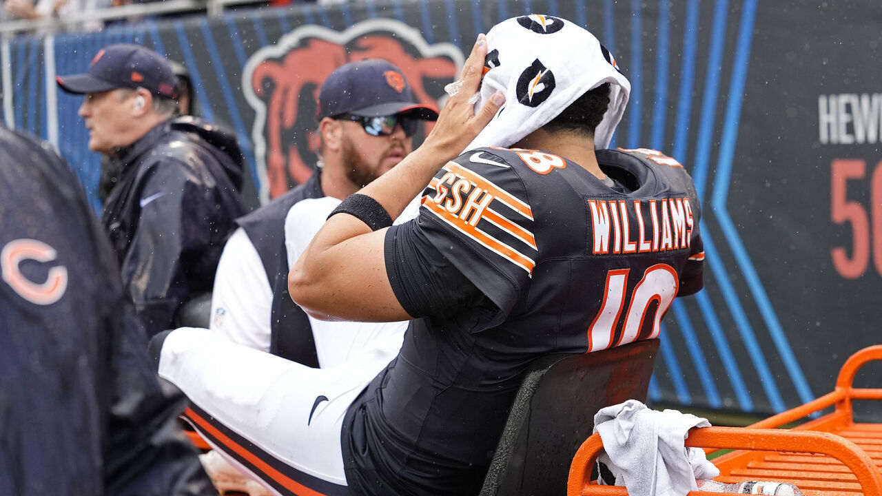CHICAGO, ILLINOIS - SEPTEMBER 20: Caleb Williams #18 of the Chicago Bears is carted off the field after an injury against the Minnesota Vikings during the third quarter of the game at Soldier Field on September 20, 2026 in Chicago, Illinois.