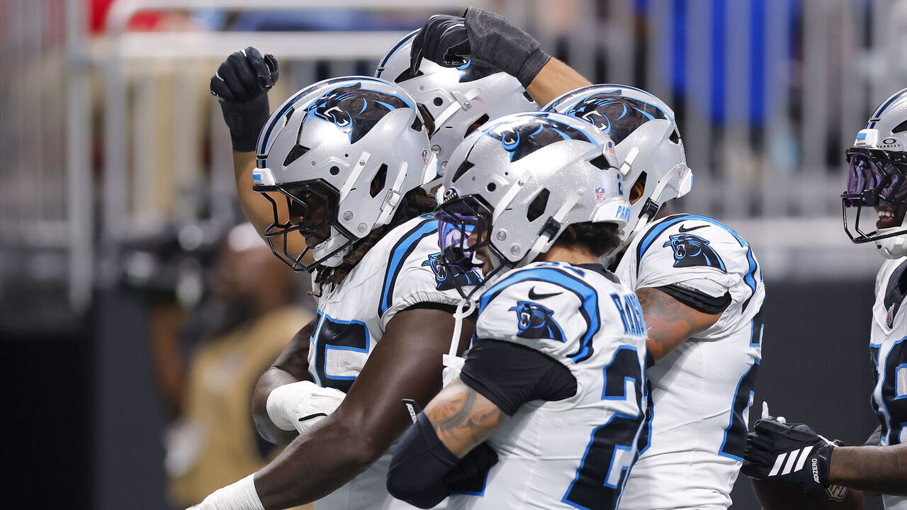 ATLANTA, GEORGIA - SEPTEMBER 20: Devin Lloyd #55 of the Carolina Panthers celebrates with teammates after an interception against the Atlanta Falcons during the fourth quarter of the game at Mercedes-Benz Stadium on September 20, 2026 in Atlanta, Georgia.