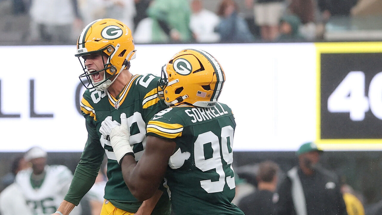 EAST RUTHERFORD, NEW JERSEY - SEPTEMBER 20: Trey Smack #28 of the Green Bay Packers celebrates kicking the game winning field goal with Barryn Sorrell #99 against the New York Jets after the game at MetLife Stadium on September 20, 2026 in East Rutherford, New Jersey.