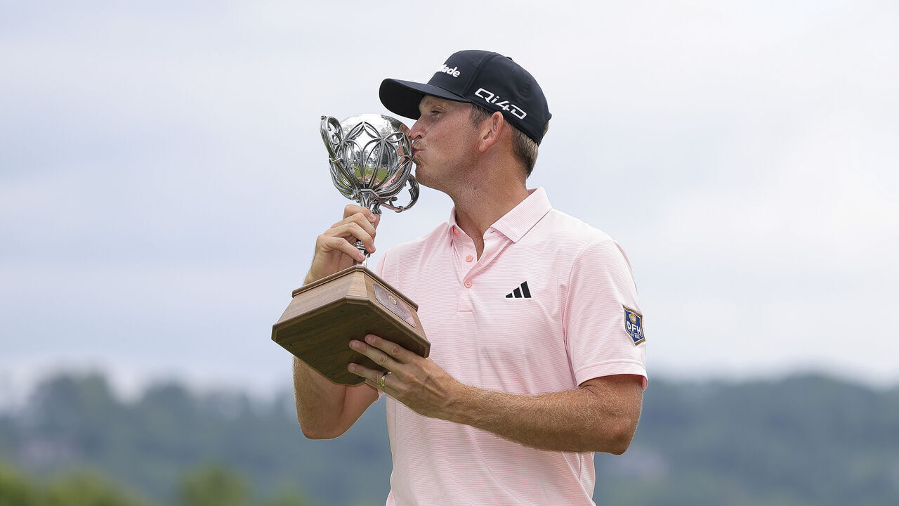 ARDEN, NORTH CAROLINA - SEPTEMBER 20: Jacob Bridgeman of the United States poses with the trophy after winning the Biltmore Championship Asheville 2026 at The Cliffs at Walnut Cove on September 20, 2026 in Arden, North Carolina.