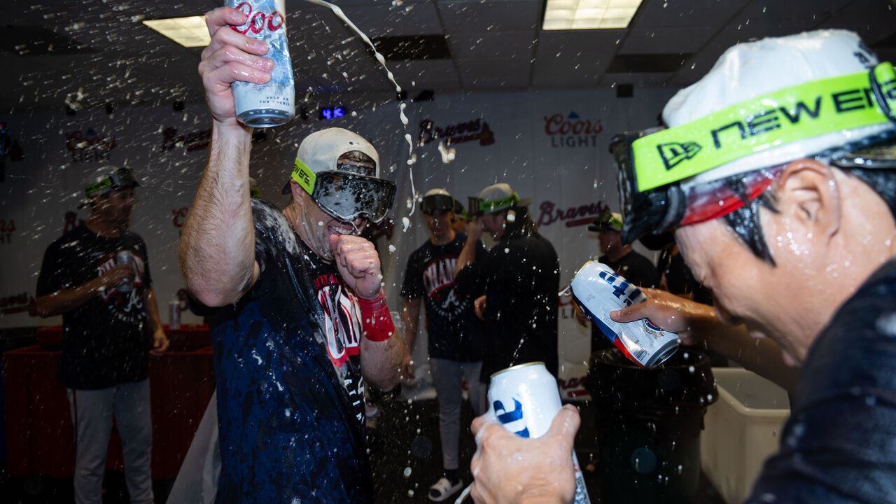 HOUSTON, TEXAS - SEPTEMBER 20: Brewer Hicklen #53 and Ha-Seong Kim #7 of the Atlanta Braves celebrate winning the National League East title after a game against the Houston Astros at Daikin Park on September 20, 2026 in Houston, Texas.