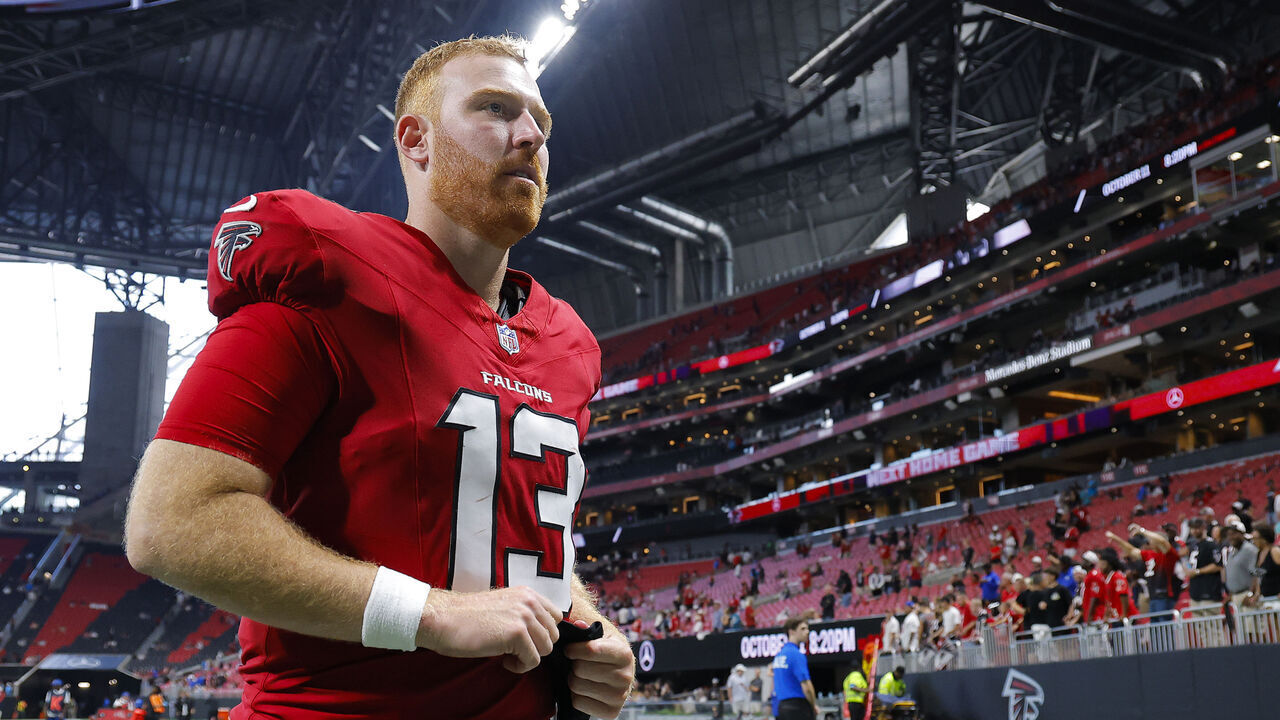 ATLANTA, GEORGIA - SEPTEMBER 20: Cooper Rush #13 of the Atlanta Falcons leaves the field after his team's 34-3 loss against the Carolina Panthers at Mercedes-Benz Stadium on September 20, 2026 in Atlanta, Georgia.