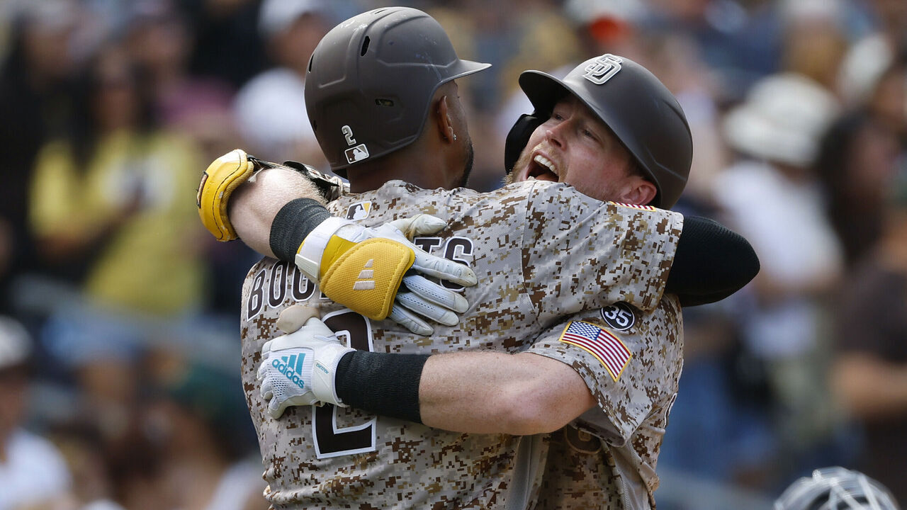San Diego, CA - September 20: Jake Cronenworth #9 of the San Diego Padres celebrates with Xander Bogaerts #2 after hitting a two-run home run in the eighth inning against the Miami Marlins at Petco Park at Petco Park on September 20, 2026 in San Diego, CA.