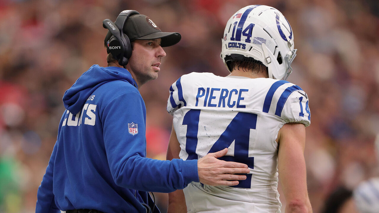 HOUSTON, TEXAS - JANUARY 04: Head coach Shane Steichen of the Indianapolis Colts walks with Alec Pierce #14 after Pierce was ejected from the game for making contact with a ref during the third quarter of the game against the Houston Texans at NRG Stadium on January 04, 2026 in Houston, Texas.