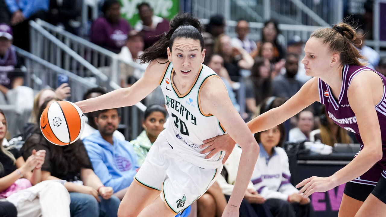 TORONTO, CANADA - SEPTEMBER 20: Breanna Stewart #30 of the New York Liberty dribbles against Laura Juskaite #2 of the Toronto Tempo during the second half of their WNBA basketball game at the Coca-Cola Coliseum on September 20, 2026 in Toronto, Ontario, Canada. NOTE TO USER: User expressly acknowledges and agrees that, by downloading and/or using this Photograph, user is consenting to the terms and conditions of the Getty Images License Agreement.
