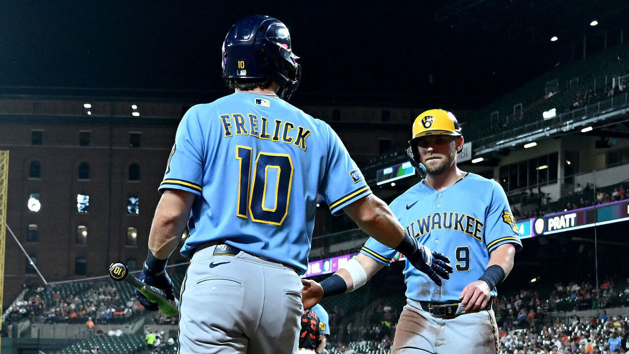 BALTIMORE, MARYLAND - SEPTEMBER 20: Jake Bauers #9 of the Milwaukee Brewers celebrates with Sal Frelick #10 after scoring in the second inning against the Baltimore Orioles at Oriole Park at Camden Yards on September 20, 2026 in Baltimore, Maryland.