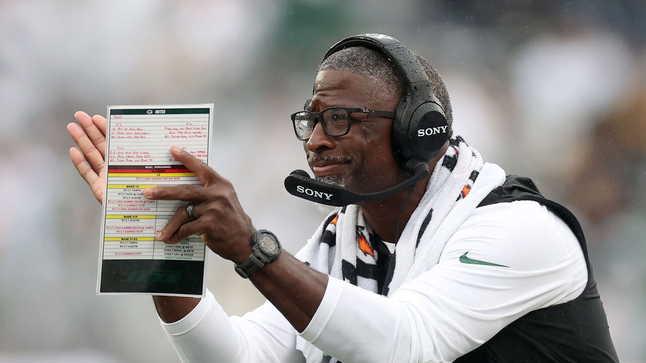 EAST RUTHERFORD, NEW JERSEY - SEPTEMBER 20: Head Coach Aaron Glenn of the New York Jets celebrates a touchdown against the Green Bay Packers during the second quarter of the game at MetLife Stadium on September 20, 2026 in East Rutherford, New Jersey.