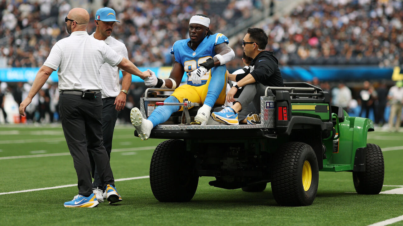 INGLEWOOD, CALIFORNIA - SEPTEMBER 20: David Njoku #83 of the Los Angeles Chargers is taken off the field after sustaining an injury during the second quarter of the game against the Las Vegas Raiders at SoFi Stadium on September 20, 2026 in Inglewood, California.