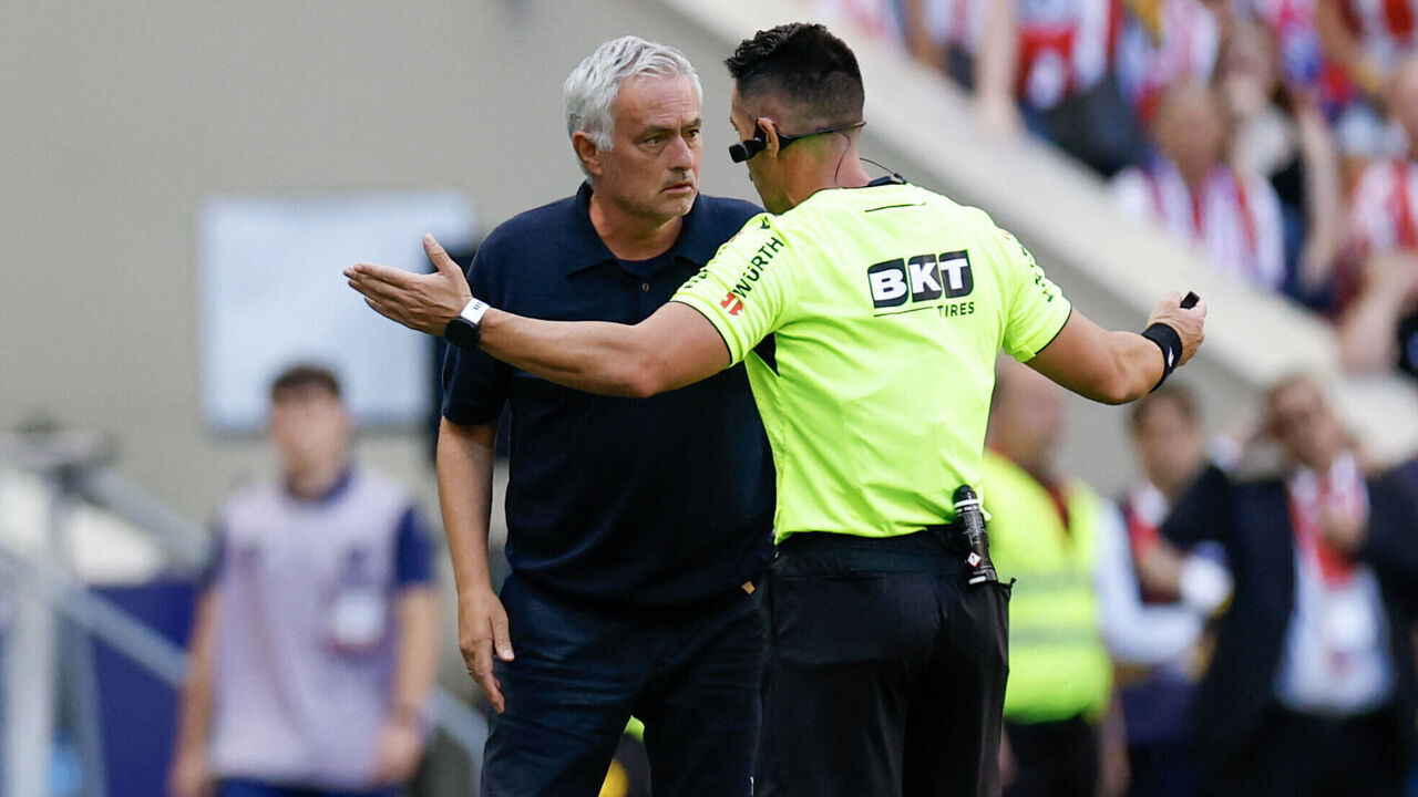 Referee Miguel Angel Ortiz Arias speaks to Real Madrid's Portuguese coach Jose Mourinho during the Spanish league football match between Club Atletico de Madrid and Real Madrid CF at the Metropolitano stadium in Madrid on September 20, 2026.