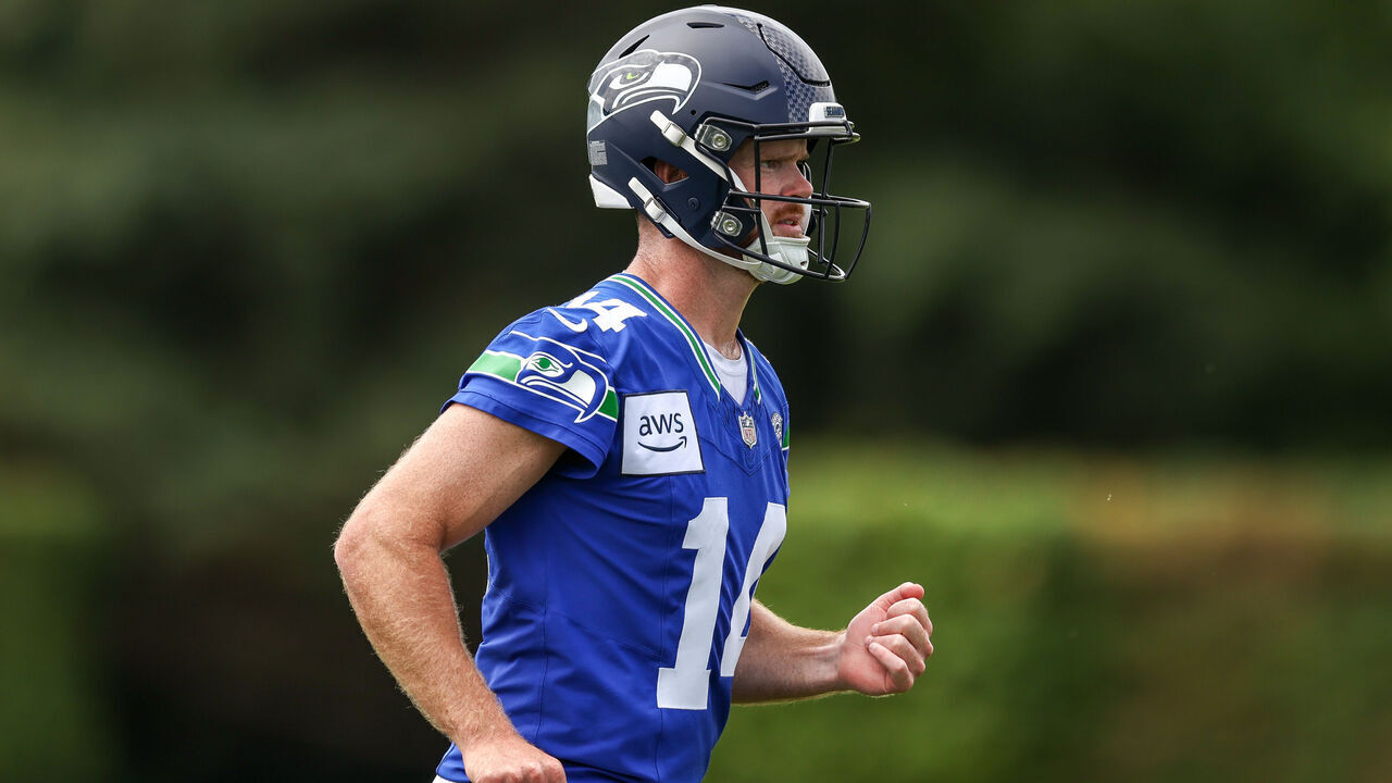 RENTON, WASHINGTON - JULY 25: Sam Darnold #14 of the Seattle Seahawks runs during practice at Virginia Mason Athletic Center on July 25, 2026 in Renton, Washington.
