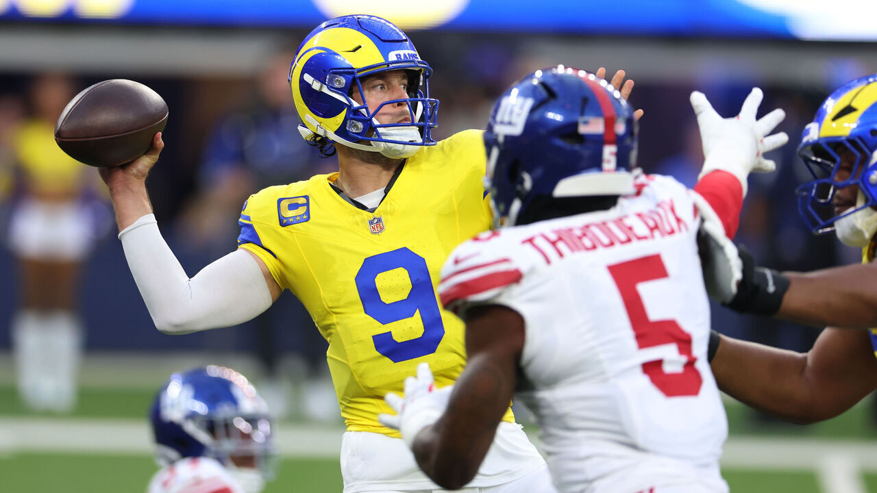 Inglewood, CA - Sept. 21, 2026: Rams quarterback Matthew Stafford throws under pressure during the Los Angeles Rams playing the New York Giants in the Rams' first home game of the 2026 regular season at SoFi Stadium on Monday Night Football. The Rams opened the season in Melbourne, Australia. (Allen J. Schaben / Los Angeles Times via Getty Images)