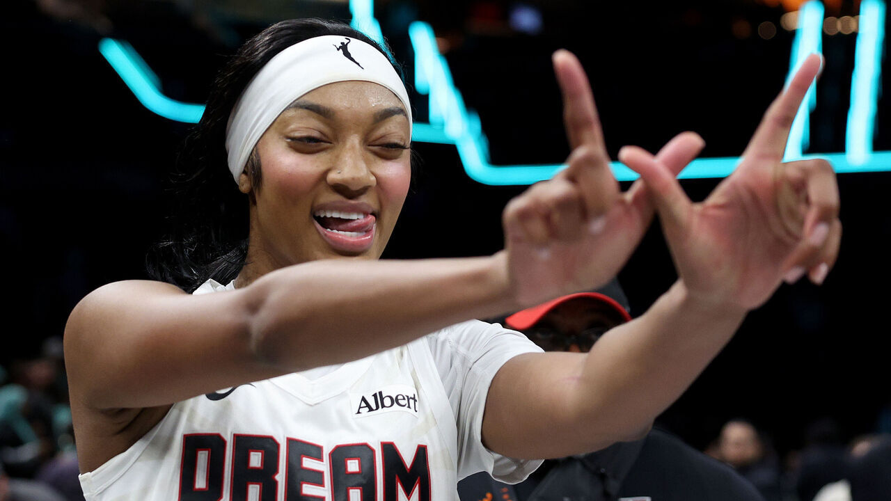 BROOKLYN, NEW YORK - SEPTEMBER 21: Angel Reese #5 of the Atlanta Dream celebrates the win after the game against the New York Liberty at Barclays Center on September 21, 2026 in the Brooklyn borough of New York City. The Atlanta Dream defeated the New York Liberty 95-84.