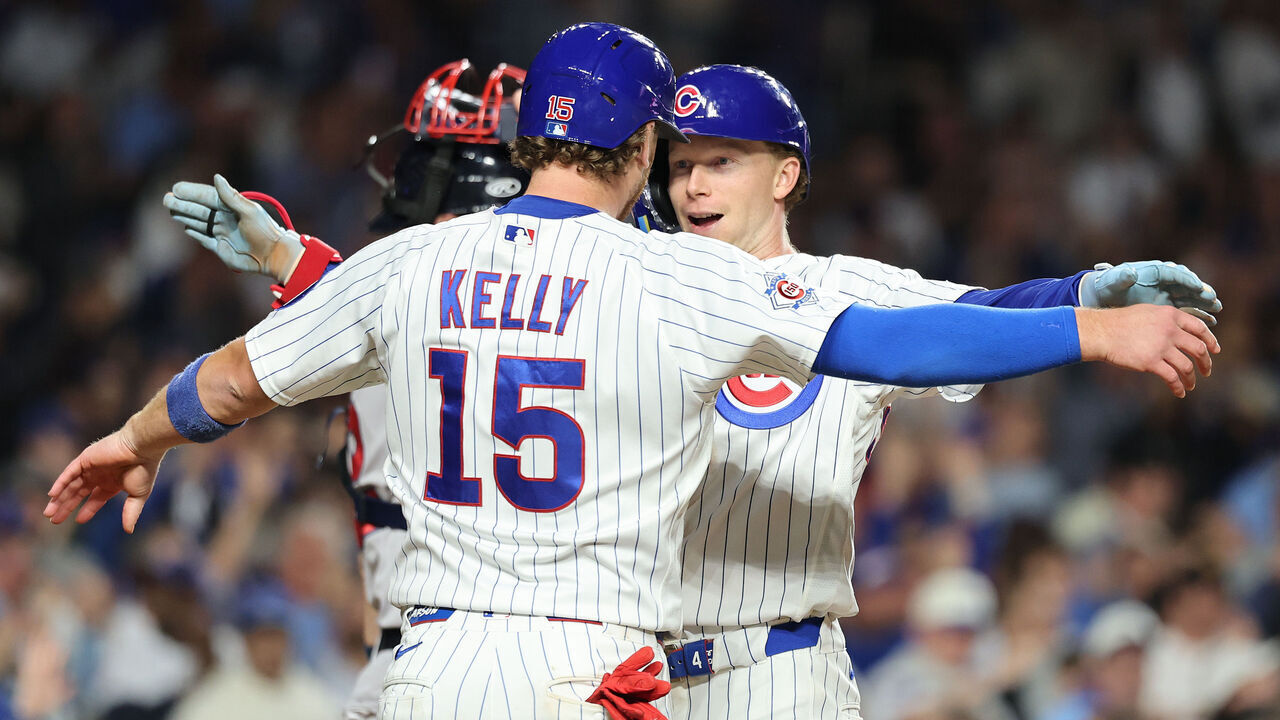 CHICAGO, ILLINOIS - SEPTEMBER 14: Pete Crow-Armstrong #4 and Carson Kelly #15 of the Chicago Cubs celebrate a two-run home run against the Atlanta Braves during the sixth inning at Wrigley Field on September 14, 2026 in Chicago, Illinois.